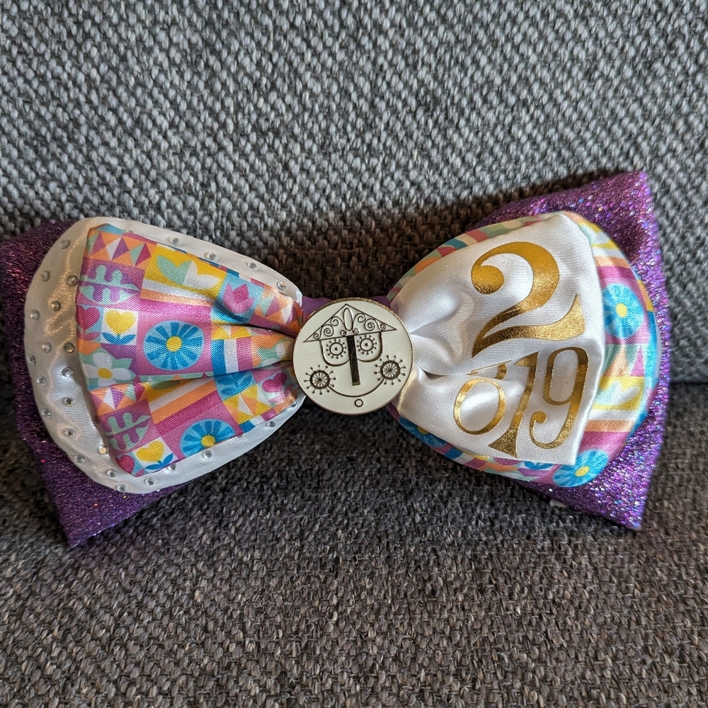 Disney Parks It's a small world bow clip